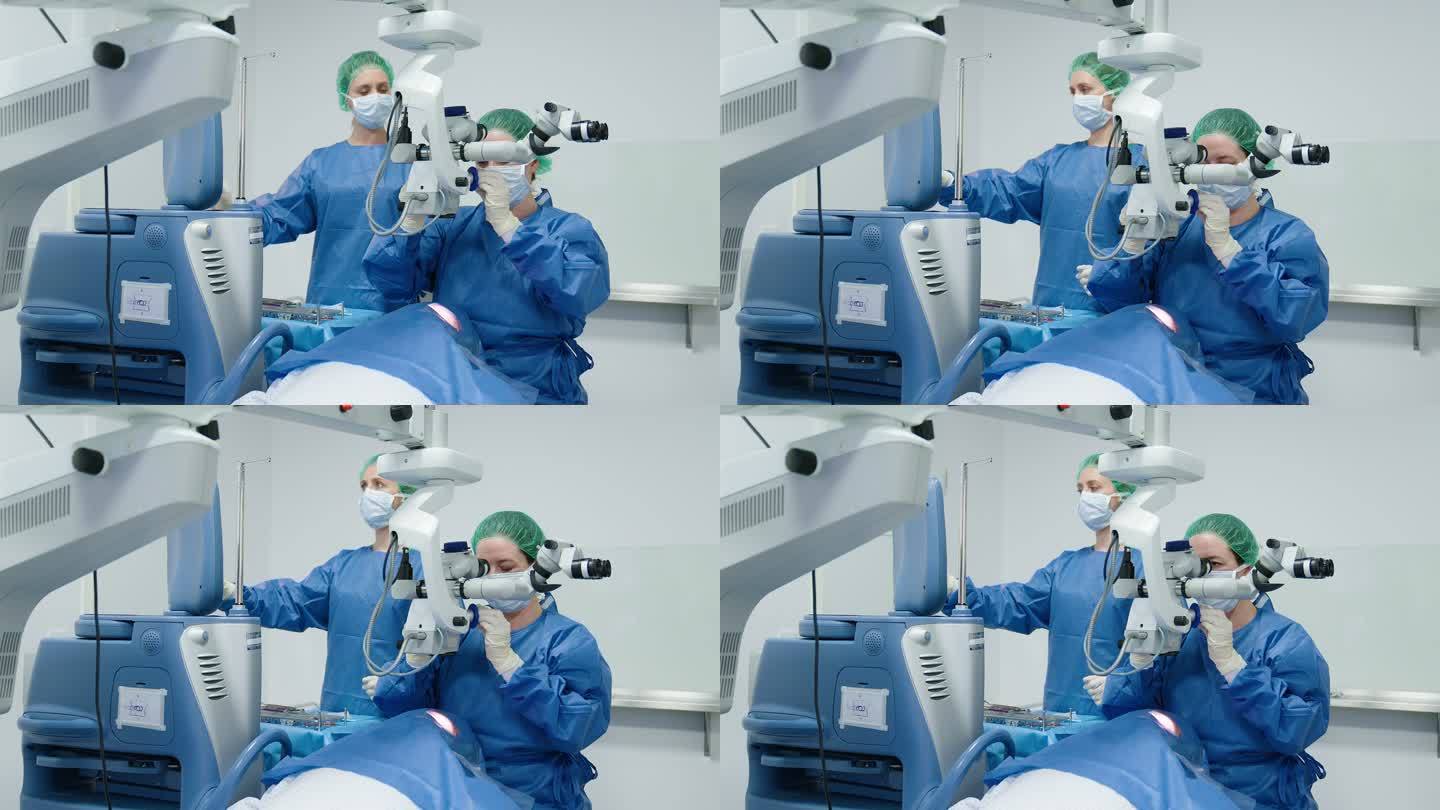 使用显微镜进行眼科手术的外科医生