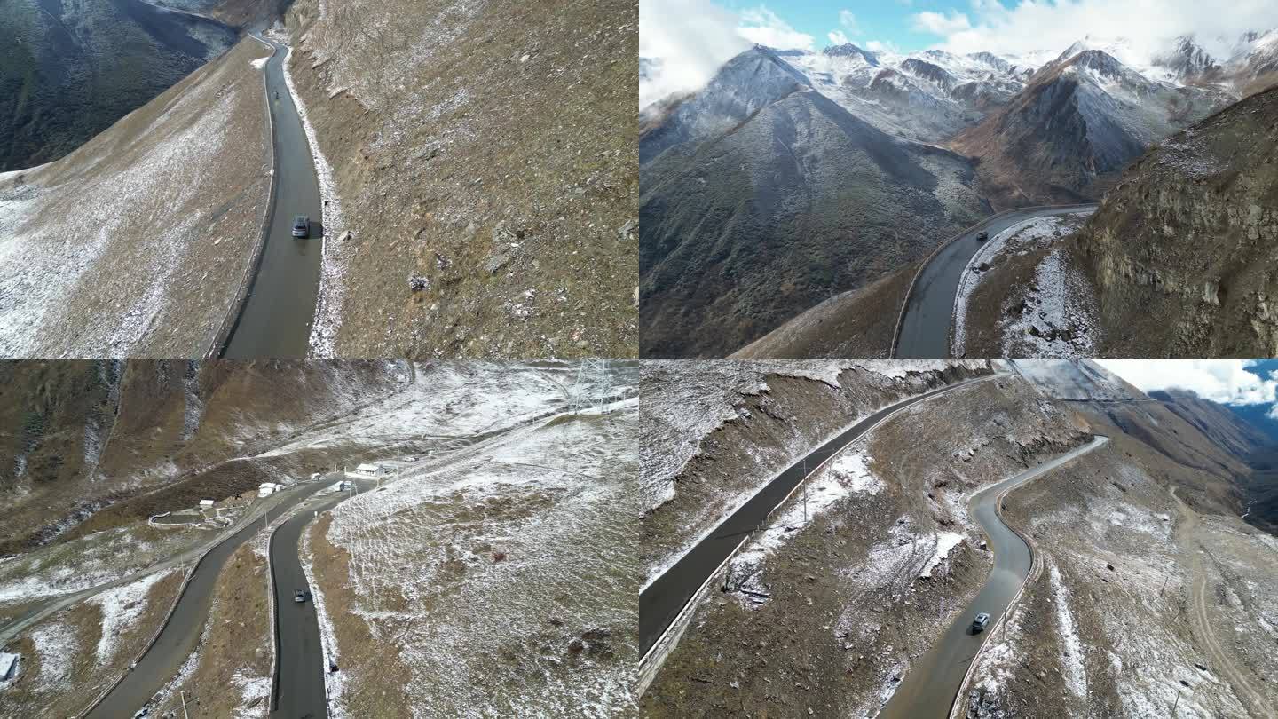 航拍行驶在盘山公路上的汽车