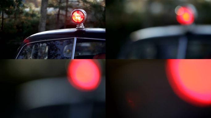 红灯闪烁的复古警车（视频）