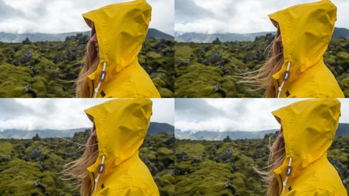 欣赏冰岛苔藓景观的年轻女性游客