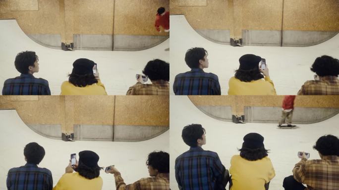 滑板运动员在坡道上给朋友拍照（慢动作）