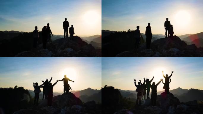 一群人山顶剪影团队精神登山素材攀登顶峰