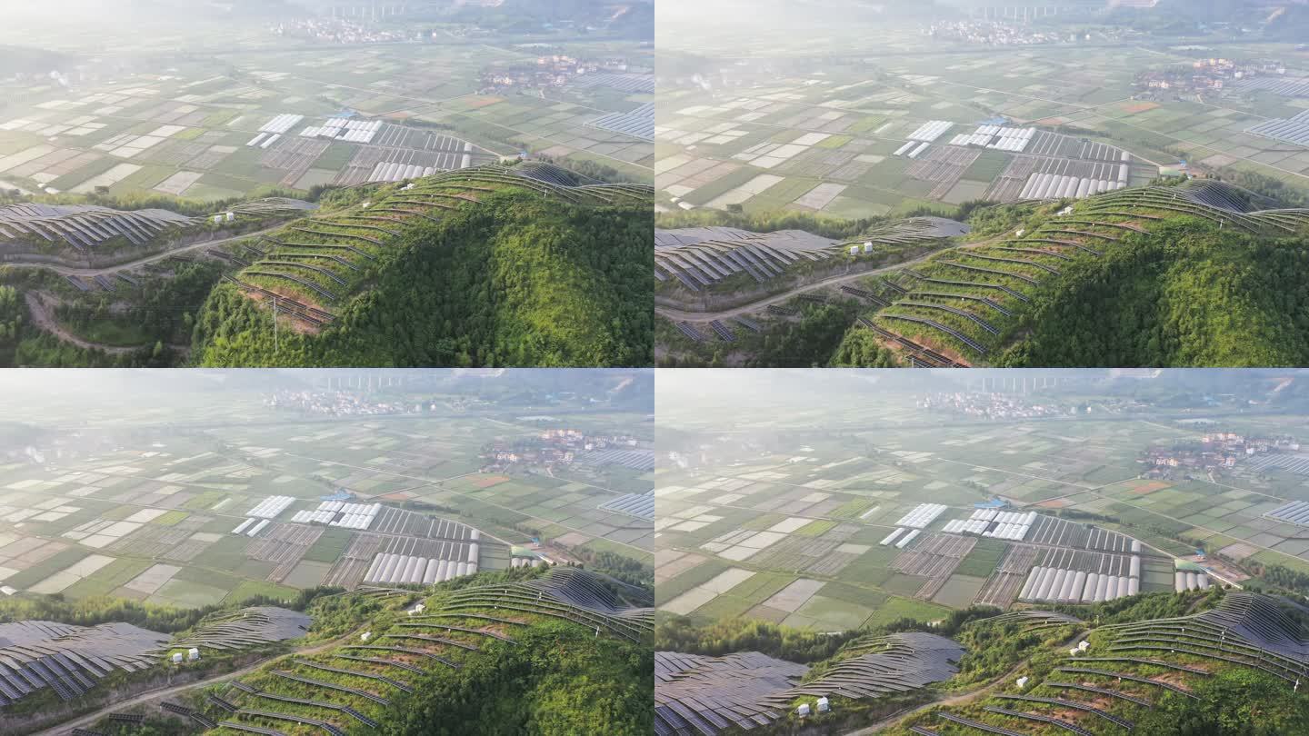 俯瞰山顶上的太阳能农场和地面上的农场