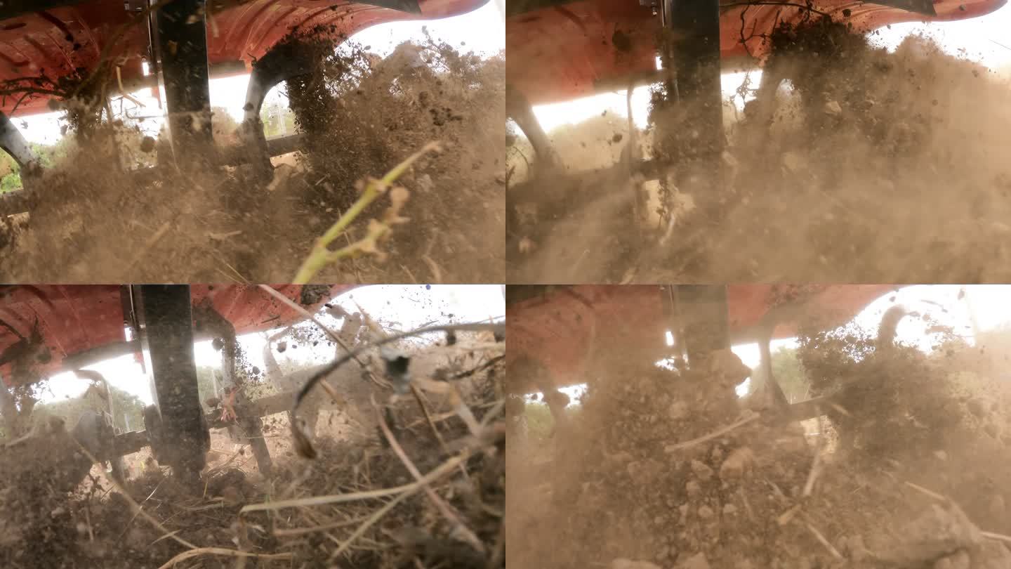 用拖拉机犁地实拍特写泥土