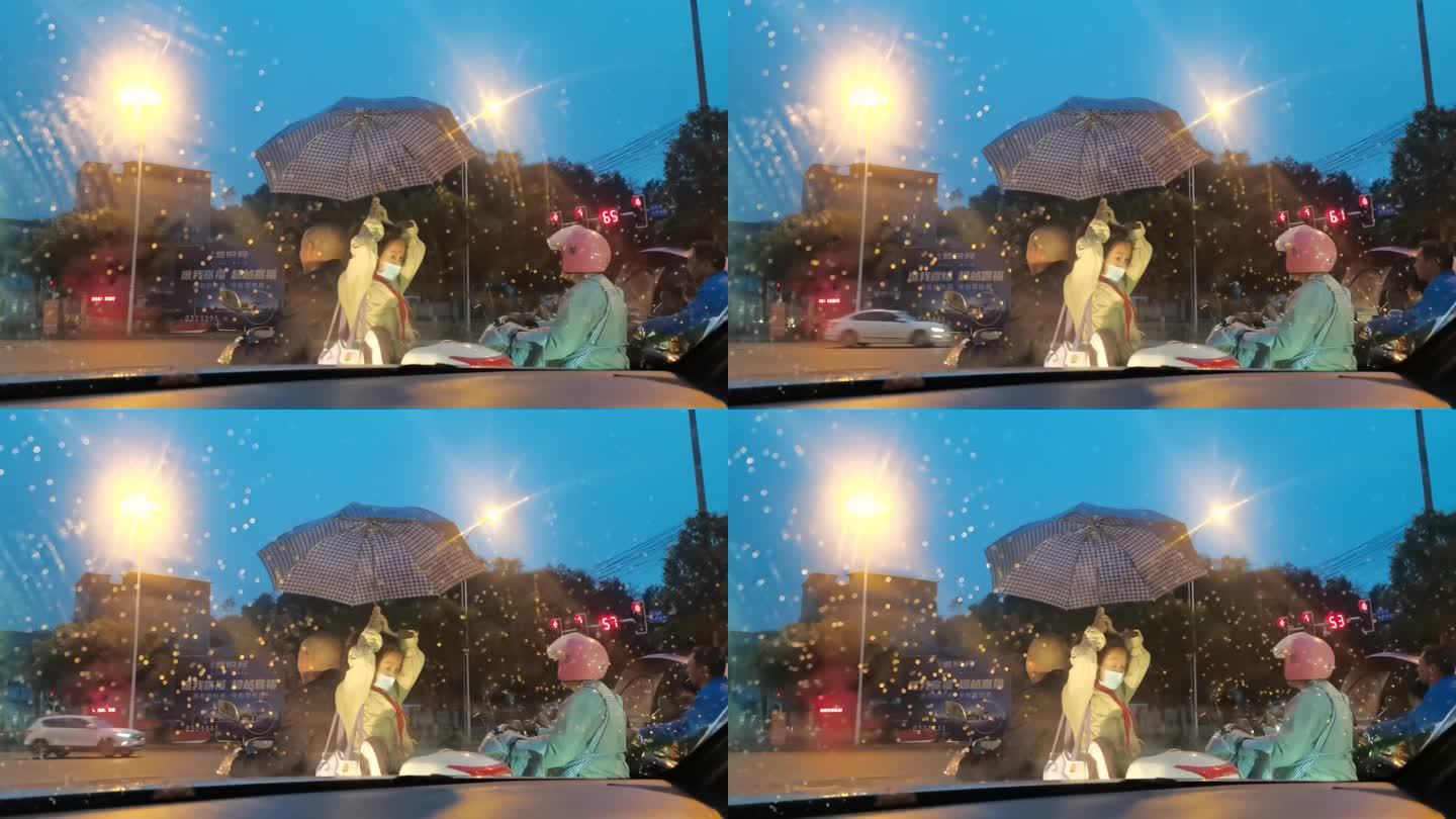 孩子雨中为父亲撑伞