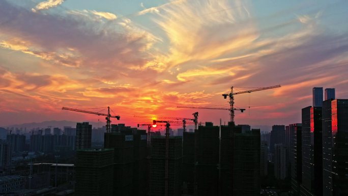 城市建设吊塔朝霞夕阳