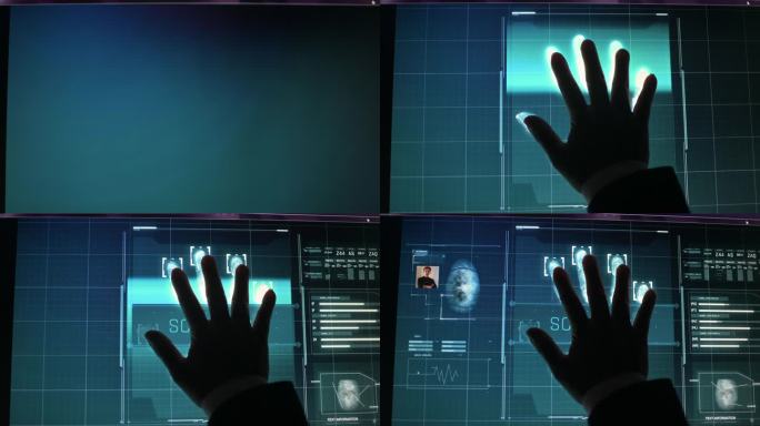 亚裔中国人穿着西装的手放在扫描设备屏幕上进行安检