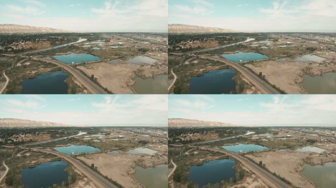 公共湖泊和砂砾坑重型设备和建筑工地工业4K无人机区域视频