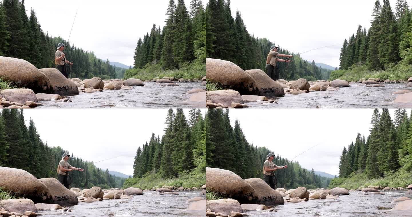 魁北克河中的老人飞钓鱼