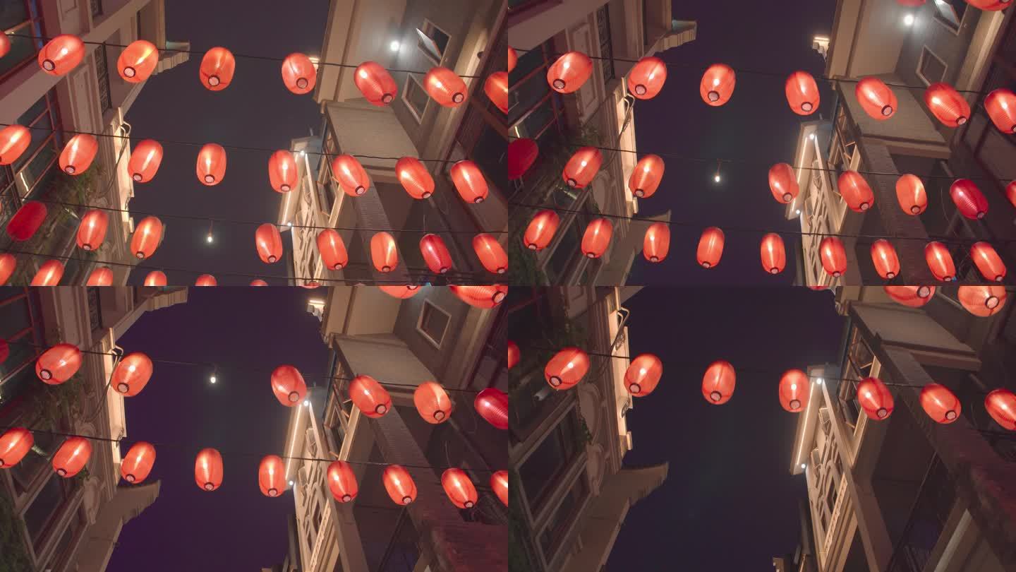 夜晚仰拍红灯笼与中国传统建筑