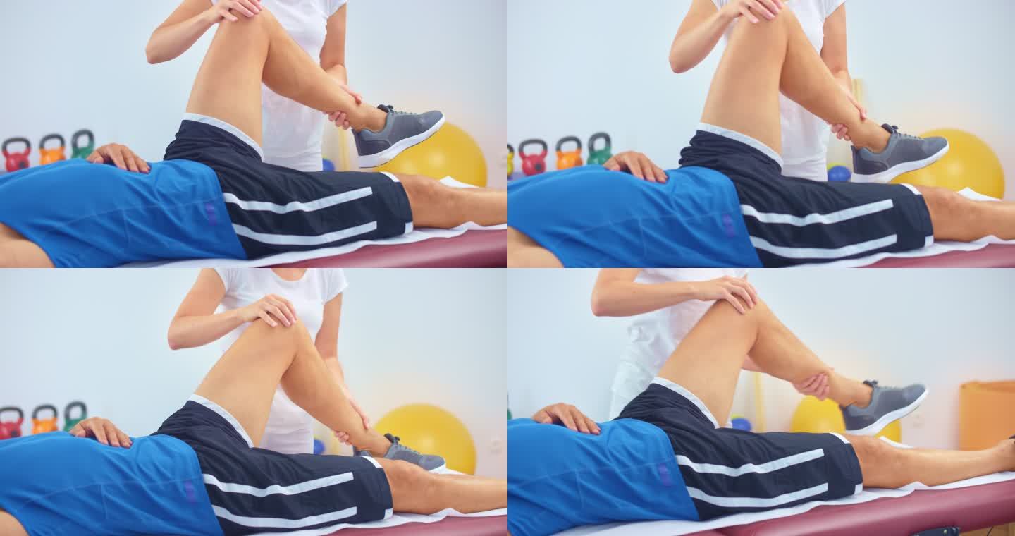 SLO MO女性运动按摩治疗师按摩男性运动员膝盖