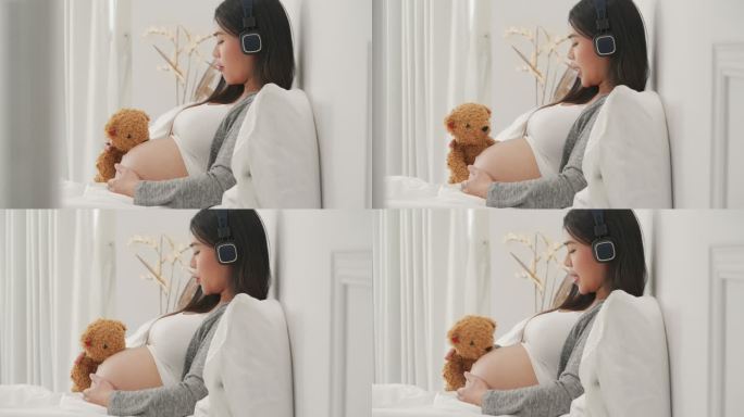 怀孕的人舒服地坐着听音乐，和他们尚未出生的孩子谈恋爱。