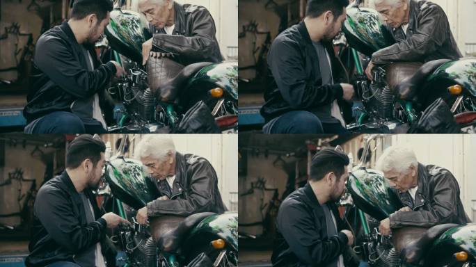 父子讨论摩托车复古机车雅马哈川崎