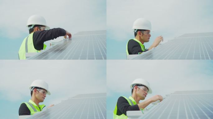 技术工人安装并维护安装的太阳能光伏板。