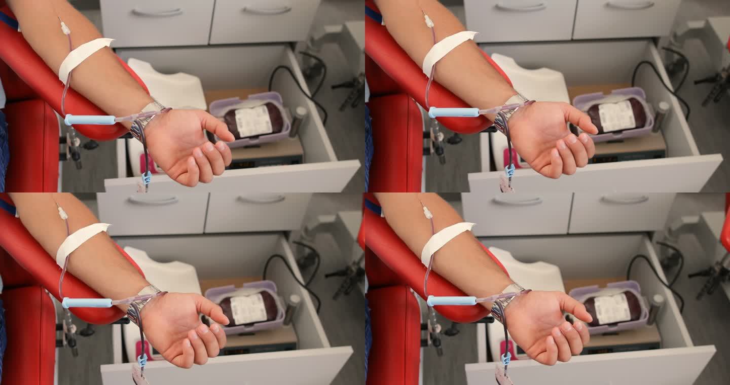 做得好。为身体献血的好处。接受输血者的手。医务室献血者特写