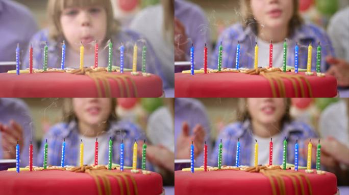 蛋糕上的生日蜡烛被吹灭了