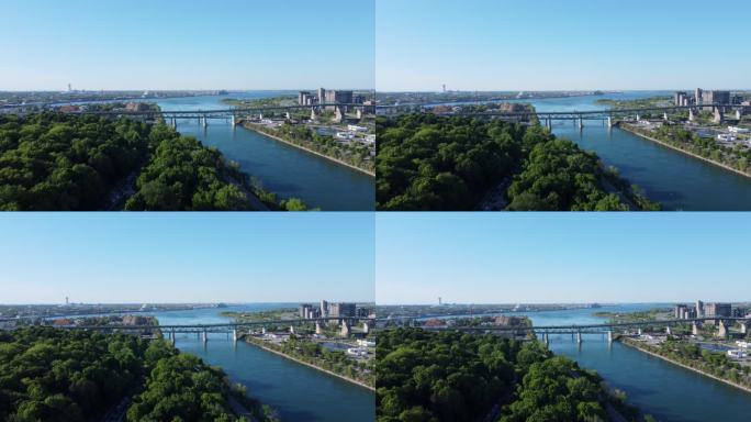 蒙特利尔市中心城市景观鸟瞰图和夏日日落时的圣劳伦斯河