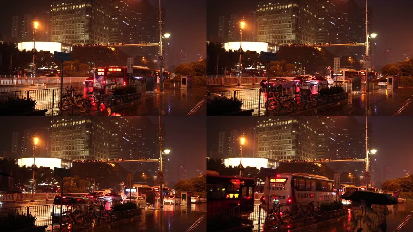 城市晚上车流堵车雨天行车红灯