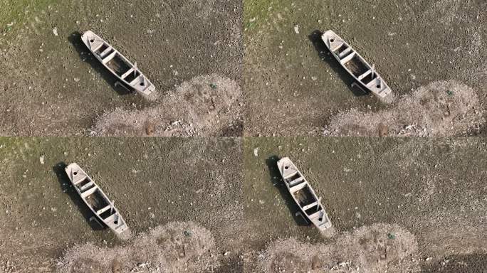 干旱枯水期河床湖底河道小船木船荒凉废弃