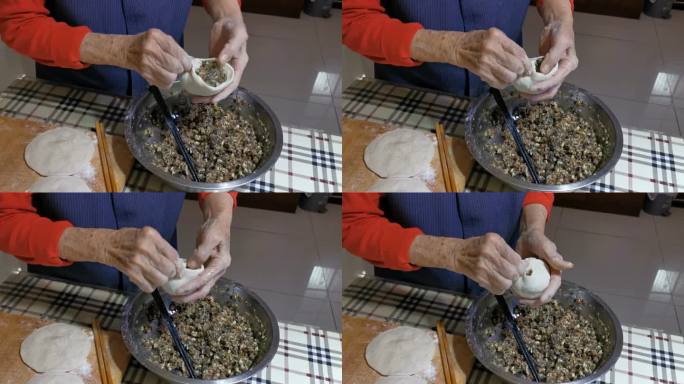 中国老人在家做肉夹馍的视频