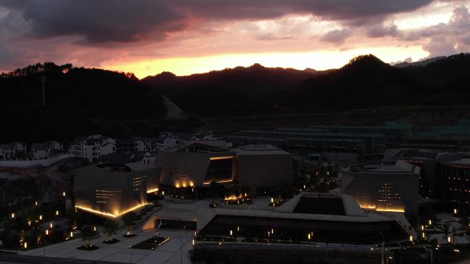 4k晚霞黄昏城市夜景建筑航拍