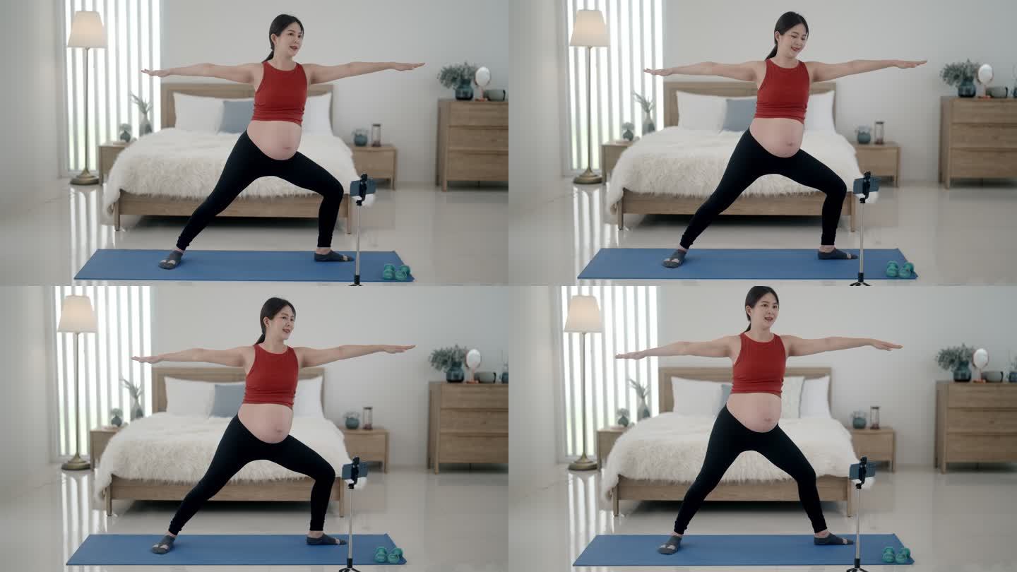 孕妇握紧肌肉孕妇居家卧室做瑜伽伸展
