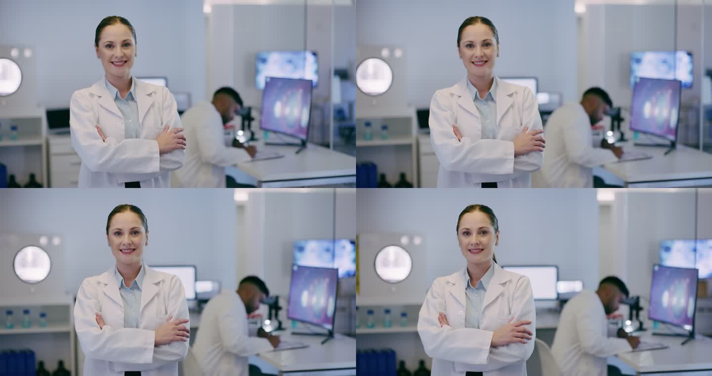 一位女科学家在实验室里双手合十，一位女士在研究中心里穿着实验室外套。一名新冠研究设施内的白人生物学家