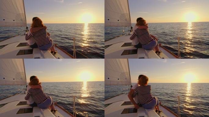 SLO MO情侣在夕阳下享受帆船