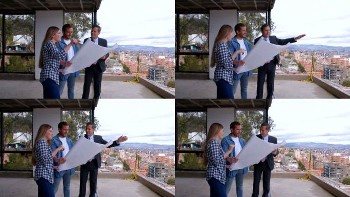 建筑承包商向这对幸福的夫妇展示蓝图，并解释他们新家施工现场的周围环境