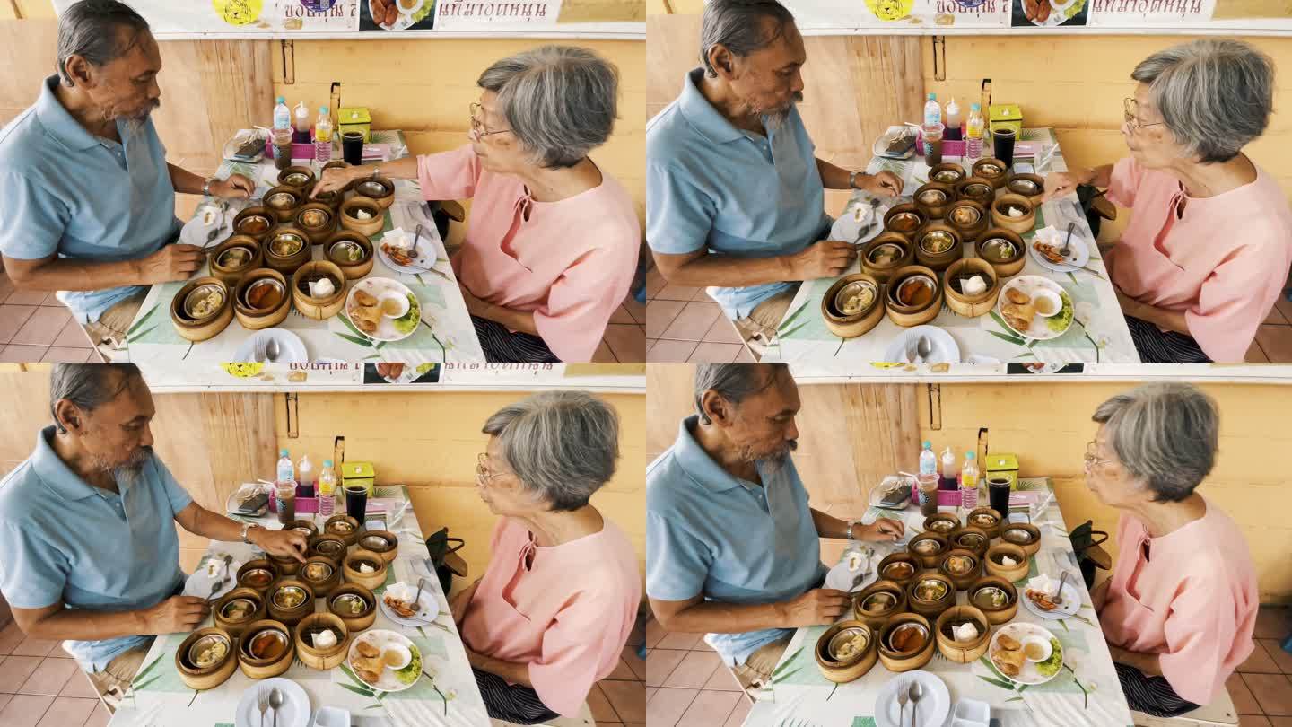 老年夫妇吃点心老年夫妇吃点心吃早餐早茶