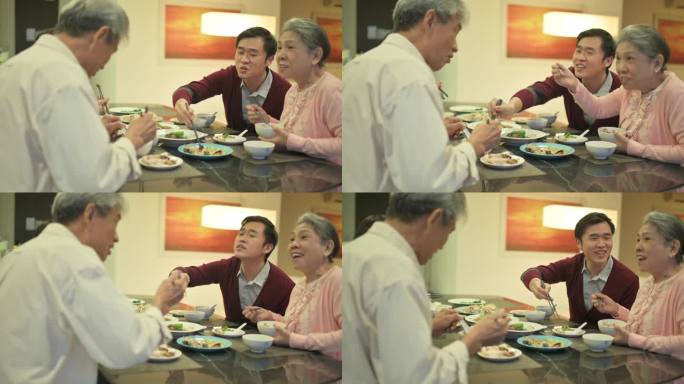 多代中国新年前夕家庭团聚晚餐在公寓