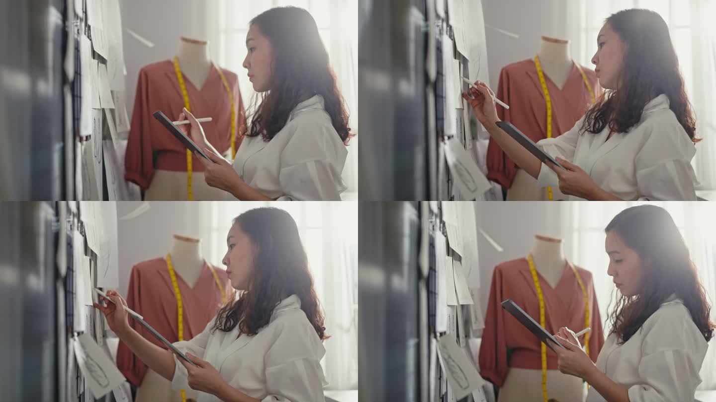 服装设计师在数字平板电脑上使用数字铅笔绘图
