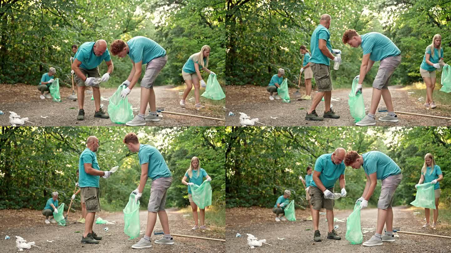 一群志愿者在大自然中捡拾垃圾和塑料
