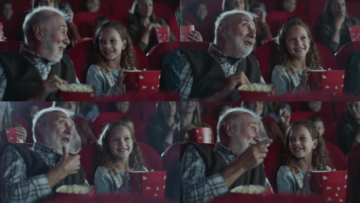 爷爷在电影院里给孙女讲解电影