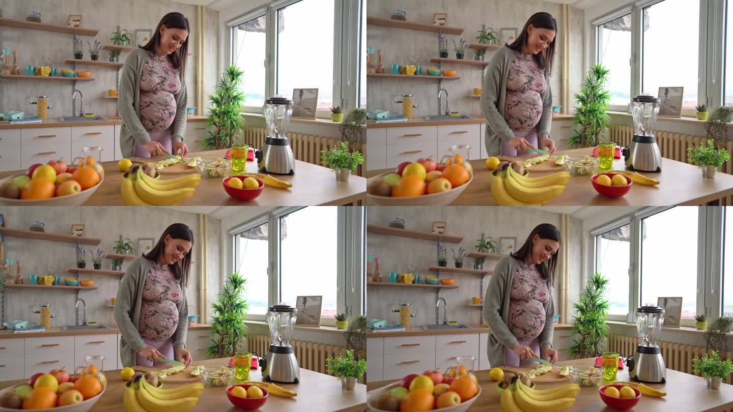孕妇在柜台上切苹果