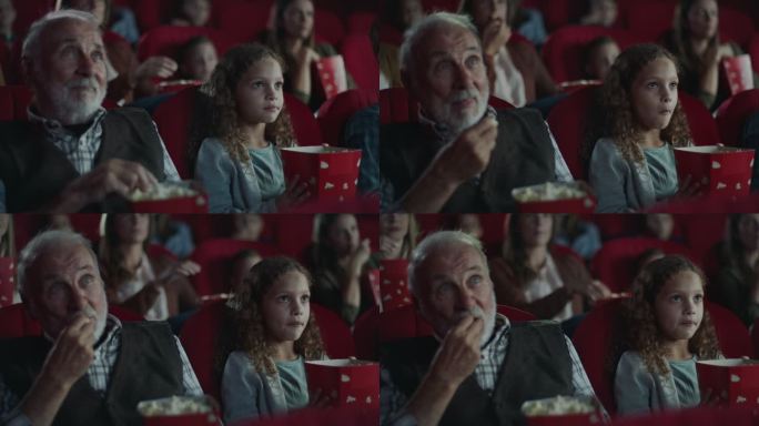 爷爷和孙女在电影院