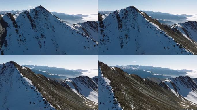 晴朗天气下航拍夹金山雪山镜头平移