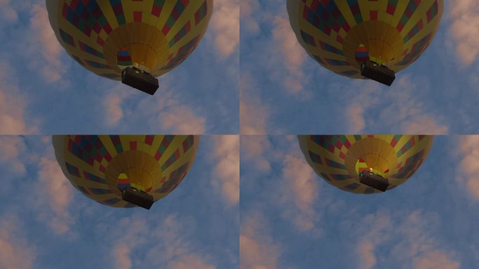 日出时，游客在卡帕多西亚的气球篮子里。