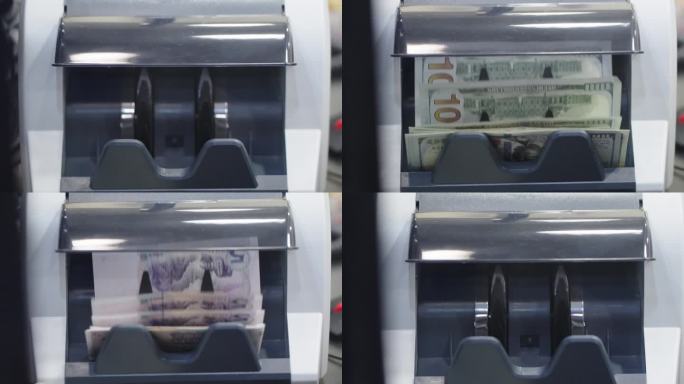 银行柜台柜员用点钞机在点钞