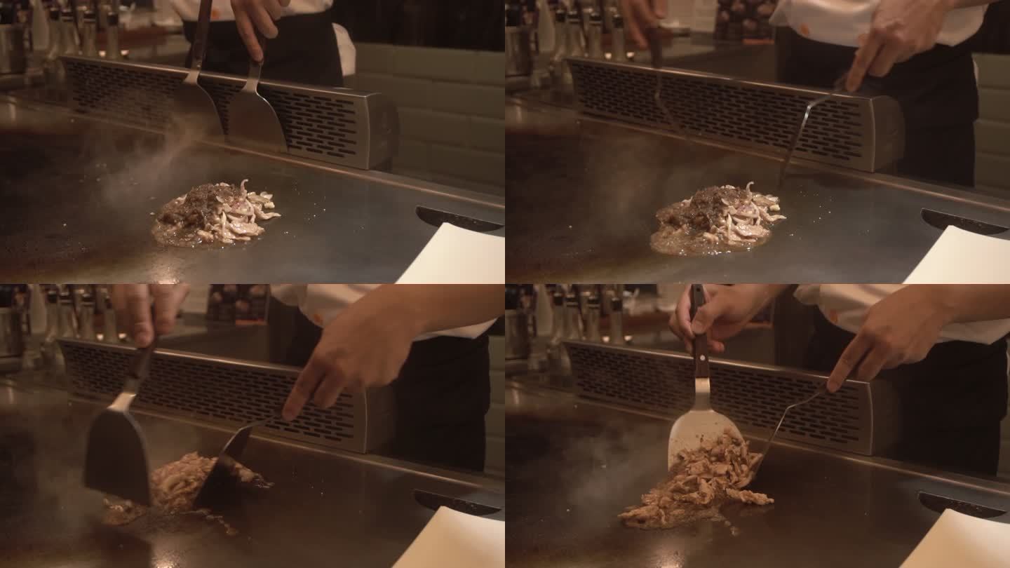 厨师为顾客准备日本铁板烧。
