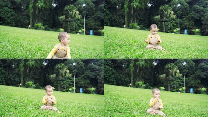 春天，小男孩在草坪上玩耍和跑步