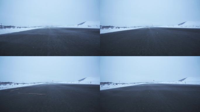 草原冬季雪天白毛风公路贴地前行