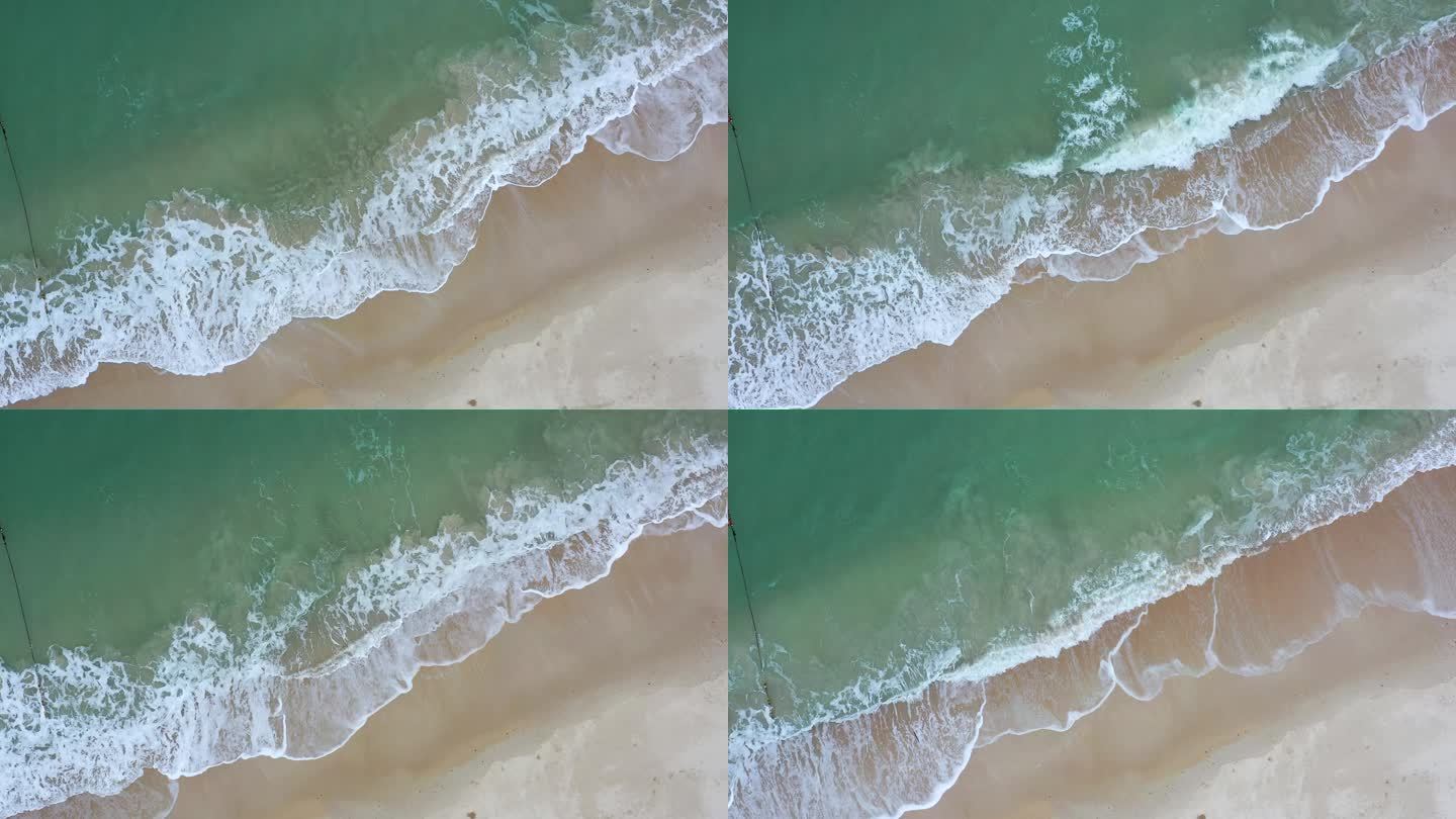 慢镜头俯视海浪、沙滩、桔钓沙