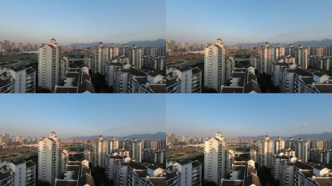 清晨的第一缕阳光照亮了城市的居民区，延时摄影
