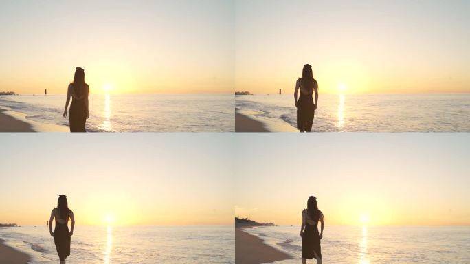 日出阳光下美女走在海边海滩沙滩漫步背影女