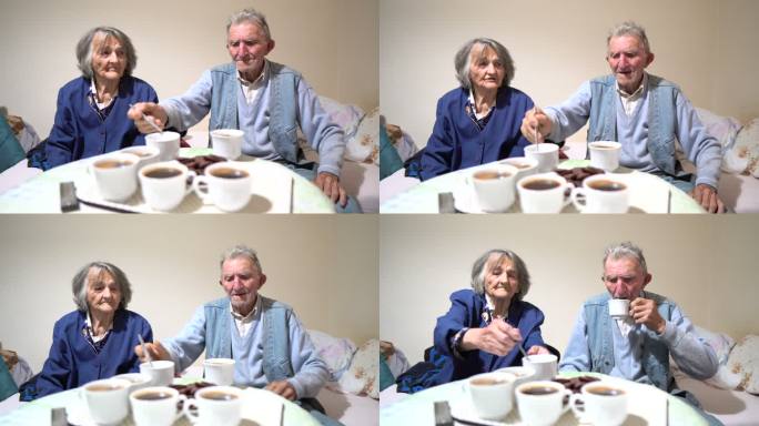 老年痴呆夫妇老年痴呆夫妇吃饭喝咖啡