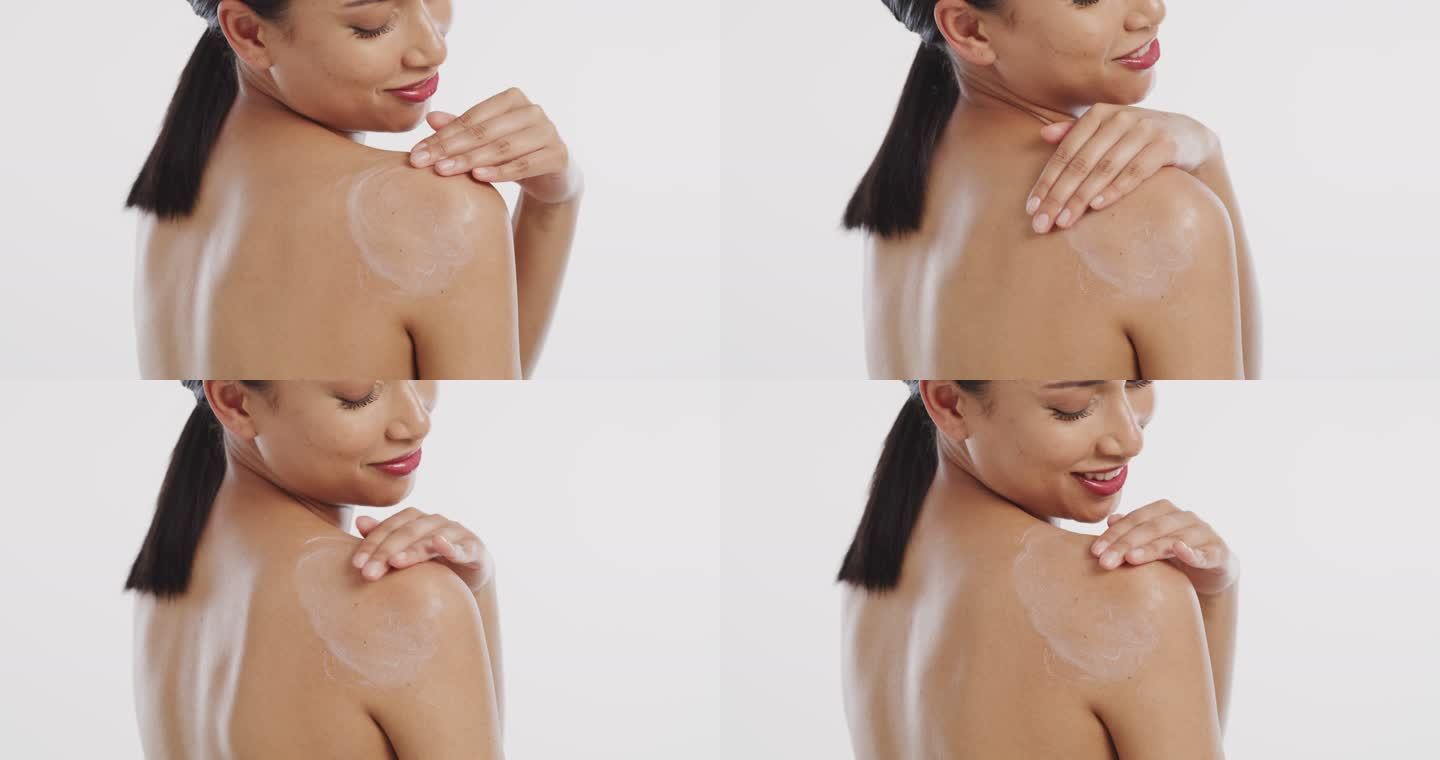 一名年轻女子在皮肤上涂抹润肤霜的4k视频片段