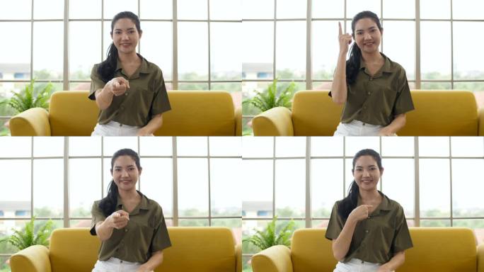 聋哑妇女用手势交流和手语交谈的肖像