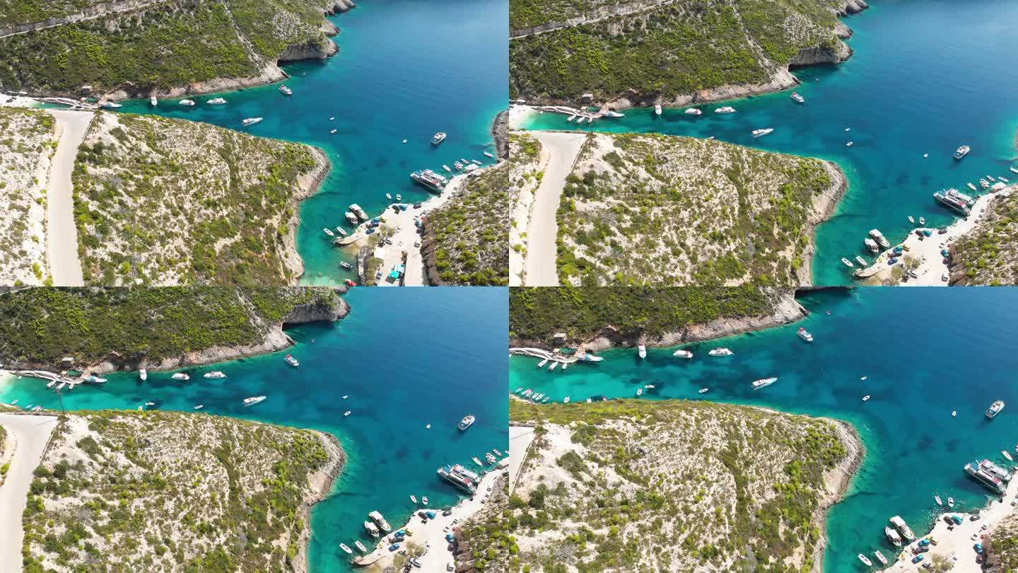 4k视频无人机在希腊扎金索斯悬崖周围的海湾上观看Porto Vromi
