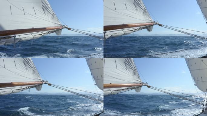 带着帆和索具沿着阳光明媚的蓝海格陵兰航行